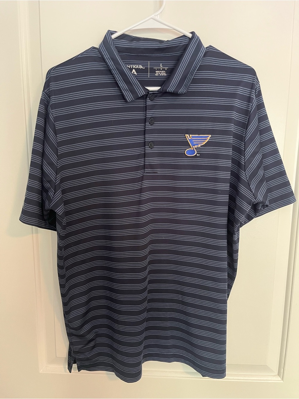 Antigua Navy and Light Blue Striped St. Louis Blues Polo
